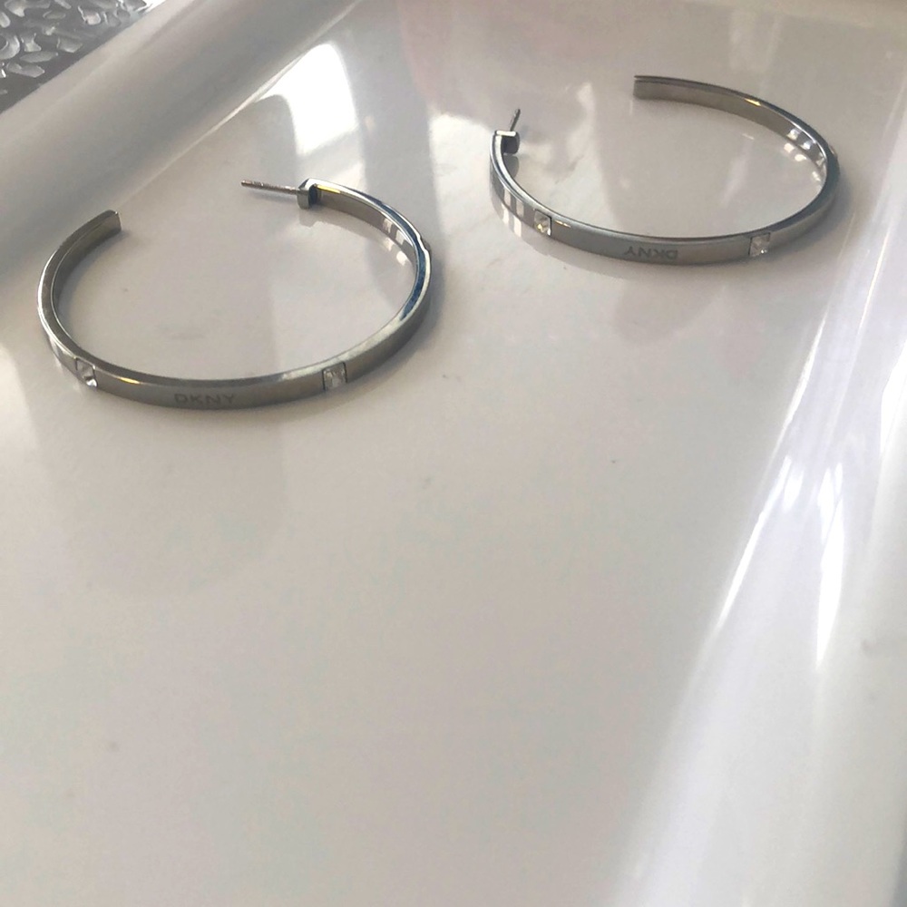 3 for $15.00: Classic silver tone DKNY hoops with crystal embellishments